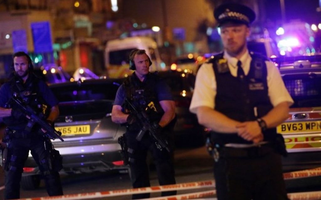 Police guard a street in the Finsbury Park area of north London after a believed terror attack against Muslim worshipers at a mosque, June 19, 2017. (AFP/Daniel Leal-Olivas)