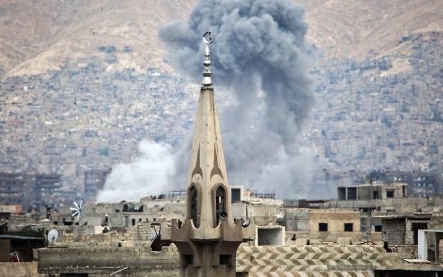 Smoke billows following a reported airstrike in the rebel-held parts of the Jobar district, on the eastern outskirts of the Syrian capital Damascus, on June 21, 2017. (AFP Photo/Amer Almohibany) Smoke billows following a reported airstrike in the rebel-held parts of the Jobar district, on the eastern outskirts of the Syrian capital Damascus, on June 21, 2017. (AFP Photo/Amer Almohibany)