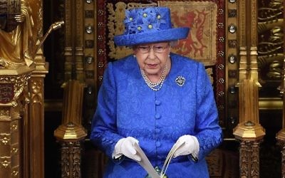 Britain's Queen Elizabeth II delivers the Queen's Speech during the State Opening of Parliament in the Houses of Parliament in London on June 21, 2017. (AFP/Carl Court)