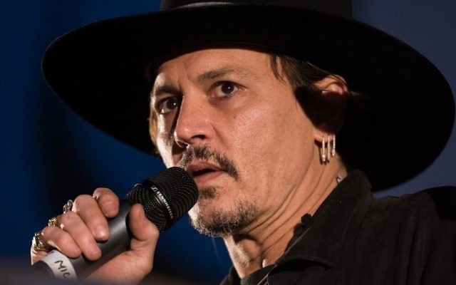 This file photo taken on June 22, 2017 shows actor Johnny Depp introducing his film 'The Libertine' to the audience at Cineramageddon, the outdoor cinema venue, at the Glastonbury Festival of Music and Performing Arts in Pilton in Somerset, South West England. (AFP/Oli Scarff) This file photo taken on June 22, 2017 shows actor Johnny Depp introducing his film 'The Libertine' to the audience at Cineramageddon, the outdoor cinema venue, at the Glastonbury Festival of Music and Performing Arts in Pilton in Somerset, South West England. (AFP/Oli Scarff)