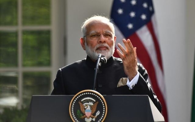 Indian Prime Minister Narendra Modi speaks during a joint press conference with US President Donald Trump (not seen) in the Rose Garden at the White House on June 26, 2017. (AFP Photo/Nicholas Kamm) Indian Prime Minister Narendra Modi speaks during a joint press conference with US President Donald Trump (not seen) in the Rose Garden at the White House on June 26, 2017. (AFP Photo/Nicholas Kamm)