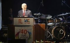 Prime Minister Benjamin Netanyahu speaks during his visit to Katzrin the Golan Heights to celebrate the 40th anniversary of its founding on June 28, 2017. (AFP Photo/Jalaa Marey)