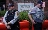 Members of Fairfax County Police stand guard at the entrance of Westfield Marriott Hotel where the Bilderberg Meeting takes place June 1, 2017 in Chantilly, Virginia. (Alex Wong/Getty Images/AFP)