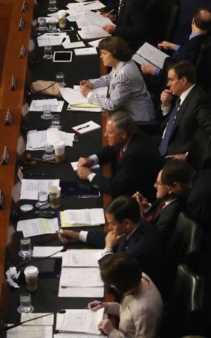 Dianne Feinstein, at top of picture, and other senators listen to former FBI Director James Comey testify during a hearing in the Hart Senate Office Building on Capitol Hill June 8, 2017. (Mark Wilson/Getty Images/AFP)
