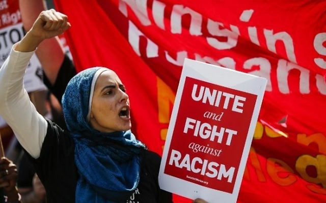 A woman shouts slogans as people march in support of Muslim community as activists take part in the 'March Against Sharia' at Foley Square on June 10, 2017 in New York City. (Eduardo Munoz Alvarez/Getty Images/AFP) A woman shouts slogans as people march in support of Muslim community as activists take part in the 'March Against Sharia' at Foley Square on June 10, 2017 in New York City. (Eduardo Munoz Alvarez/Getty Images/AFP)