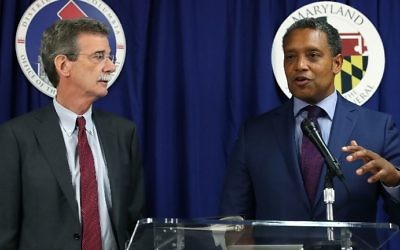 Maryland Attorney General Brian Frosh (L) and District of Columbia Attorney General Karl Racine speak to the media about filing a lawsuit against US President Donald Trump, on June 12, 2017 in Washington, DC. (Mark Wilson/Getty Images/AFP)