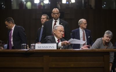 US Attorney General Jeff Sessions prepares to leave after testifying before the Senate Intelligence Committee on Capitol Hill June 13, 2017 in Washington, DC.  (Zach Gibson/Getty Images/AFP)