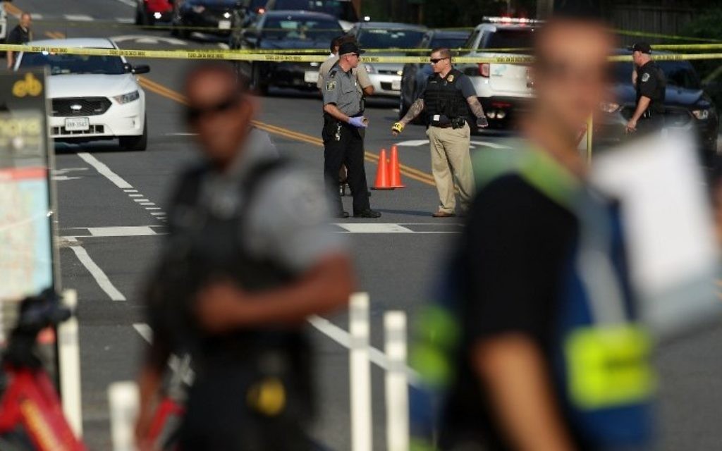 Investigators gather near the scene of a shooting June 14, 2017, in Alexandria, Virginia. (Alex Wong/Getty Images/AFP)