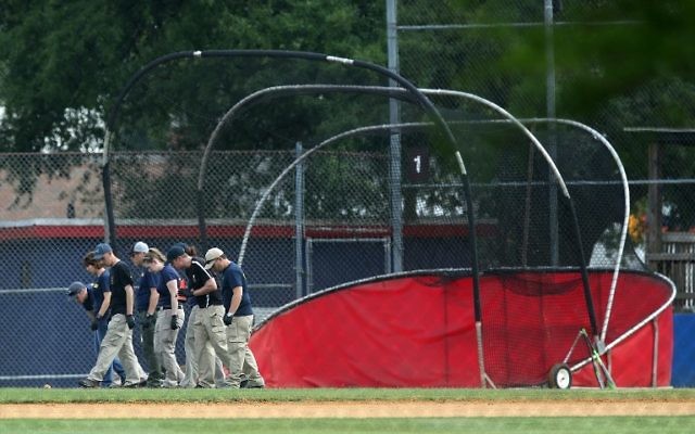 Investigators search for evidence at the Eugene Simpson Stadium Park where a shooting had happened June 14, 2017 in Alexandria, Virginia. (Alex Wong/Getty Images/AFP)