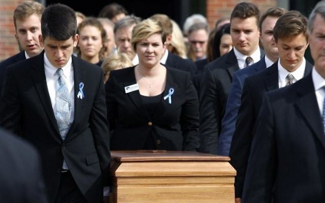 The casket of Otto Warmbier is carried out from his funeral at Wyoming High School June 22, 2017 in Wyoming, Ohio. (Bill Pugliano/Getty Images/AFP) The casket of Otto Warmbier is carried out from his funeral at Wyoming High School June 22, 2017 in Wyoming, Ohio. (Bill Pugliano/Getty Images/AFP)