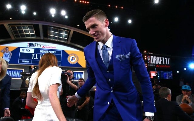 T.J. Leaf reacts after being drafted 18th overall by the Indiana Pacers during the first round of the 2017 NBA Draft at Barclays Center on June 22, 2017 in New York City. (Mike Stobe/Getty Images/AFP) T.J. Leaf reacts after being drafted 18th overall by the Indiana Pacers during the first round of the 2017 NBA Draft at Barclays Center on June 22, 2017 in New York City. (Mike Stobe/Getty Images/AFP)