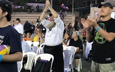 Fans applaud as the NFL Hall of Famers are introduced at a June 18, 2017 ceremony at Kraft Family Stadium in Jerusalem. (Jacob Magid/Times of Israel)