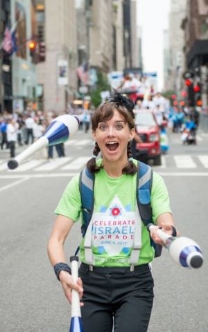 A juggler at the Celebrate Israel Parade in New York City, June 4, 2017. (Alexi Rosenberg)