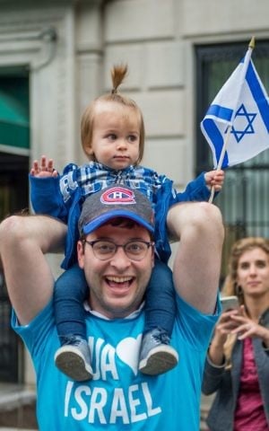 Two attendees at the Celebrate Israel Parade in New York City on June 4, 2017. (Alexi Rosenberg)