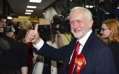 Britain's Labour Party leader Jeremy Corbyn gestures as he arrives for the declaration at his constituency in London, Friday, June 9, 2017 (Dominic Lipinski/PA via AP)
