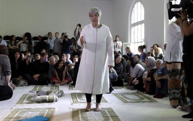 Seyran Ates, standing at center, founder of the Ibn-Rushd-Goethe-Mosque gestures during the opening of the mosque in Berlin, Germany, Friday, June 16, 2017. (AP/Michael Sohn) Seyran Ates, standing at center, founder of the Ibn-Rushd-Goethe-Mosque gestures during the opening of the mosque in Berlin, Germany, Friday, June 16, 2017. (AP/Michael Sohn)