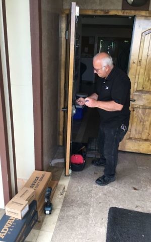 In this June 1, 2017, photo, locksmith Jim King upgrades the locks on the Eugene Islamic Center in Eugene, Ore. The center was targeted by a death threat in May 2017. (AP Photo/Andrew Selsky) In this June 1, 2017, photo, locksmith Jim King upgrades the locks on the Eugene Islamic Center in Eugene, Ore. The center was targeted by a death threat in May 2017. (AP Photo/Andrew Selsky)