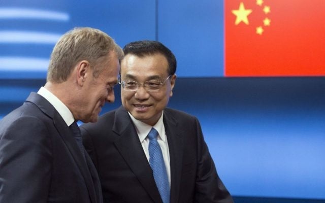 Chinese Premier Li Keqiang, right, speaks with European Council President Donald Tusk as he arrives prior to a meeting at the Europa building in Brussels on Thursday, June 1, 2017. (Olivier Hoslet, Pool Photo via AP) Chinese Premier Li Keqiang, right, speaks with European Council President Donald Tusk as he arrives prior to a meeting at the Europa building in Brussels on Thursday, June 1, 2017. (Olivier Hoslet, Pool Photo via AP)