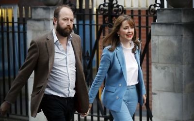 British Prime Minister Theresa May's chief of staff Nick Timothy and joint-chief of staff Fiona Hill leave Conservative Party headquarters in London, Friday, June 9, 2017. (AP Photo/Frank Augstein)