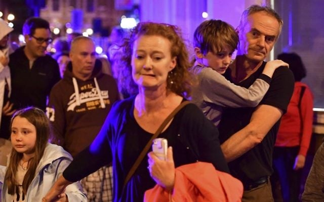People run down Borough High Street as police deal with a "major incident" at London Bridge in London, June 3, 2017. (Dominic Lipinski/PA via AP) People run down Borough High Street as police deal with a "major incident" at London Bridge in London, June 3, 2017. (Dominic Lipinski/PA via AP)