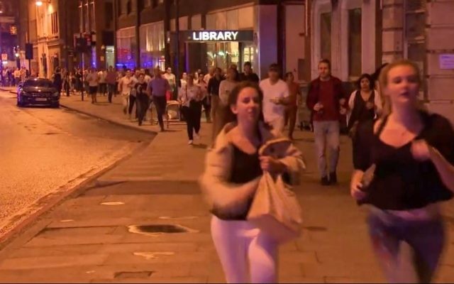 In this Saturday, June 3, 2017, image made from a video, people run from the scene an attack in London. Chaos broke out for several minutes during Saturday night's attack in the heart of the city, with people scattering in all directions, sometimes directly into the path of the men trying to kill them. (Sky news via AP) In this Saturday, June 3, 2017, image made from a video, people run from the scene an attack in London. Chaos broke out for several minutes during Saturday night's attack in the heart of the city, with people scattering in all directions, sometimes directly into the path of the men trying to kill them. (Sky news via AP)