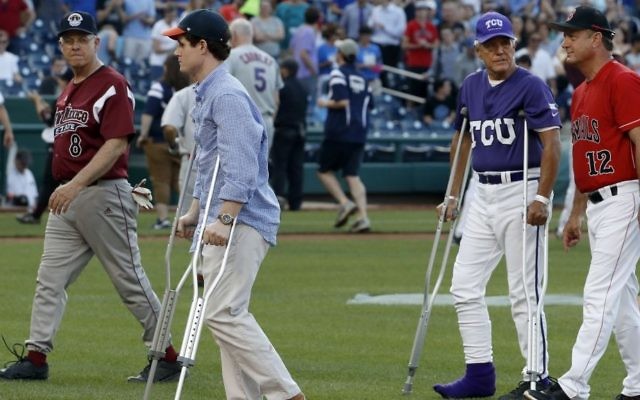 Injured aide Zach Barth (L) and Republican Congressman Roger Williams walk off the field before the annual congressional baseball game in Washington, DC, June 15, 2017. (AP Photo/Alex Brandon) Injured aide Zach Barth (L) and Republican Congressman Roger Williams walk off the field before the annual congressional baseball game in Washington, DC, June 15, 2017. (AP Photo/Alex Brandon)
