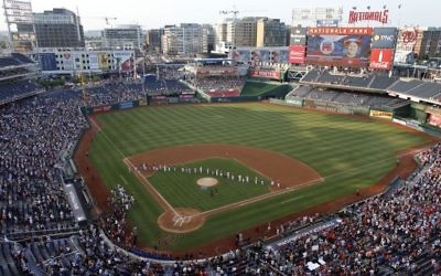 A photo of House Majority Whip Steve Scalise, R-La., is seen on the video board as the last member of the Republican team announced before the Congressional baseball game, Thursday, June 15, 2017, in Washington. The annual GOP-Democrats baseball game raises money for charity. (AP Photo/Alex Brandon)