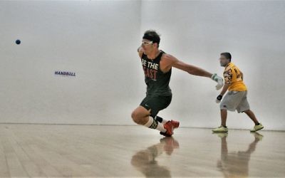 Handball star David Fink dives for a ball. (Courtesy)