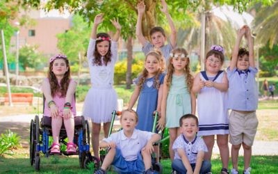 The Summer 2017 collection for Select Fashion, an Israeli clothing manufacturer, included children with special needs as models; Hallel Markowitz is second from right (Courtesy Dmitriy Green)