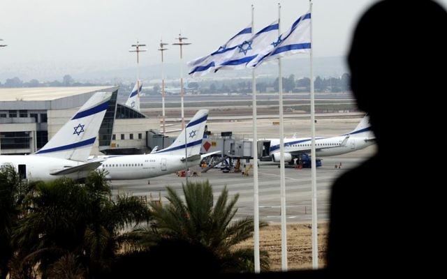 A passenger observes the runway from a window at Israel's Ben Gurion International Airport near Tel Aviv, April 21, 2013. (Flash90) A passenger observes the runway from a window at Israel's Ben Gurion International Airport near Tel Aviv, April 21, 2013. (Flash90)