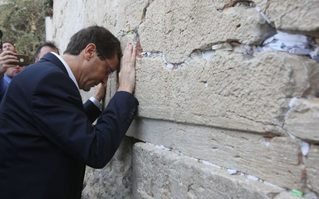 Isaac Herzog praying at the Western Wall in Jerusalem on October 8, 2015. (Yonatan Sindel/Flash90) Isaac Herzog praying at the Western Wall in Jerusalem on October 8, 2015. (Yonatan Sindel/Flash90)