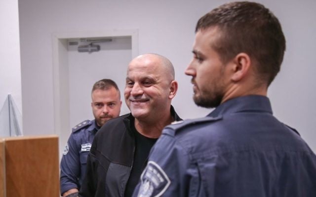 Crime boss Rico Shirazi at the Tel Aviv District Court, December 7, 2015. (Nati Shohat/Flash90)