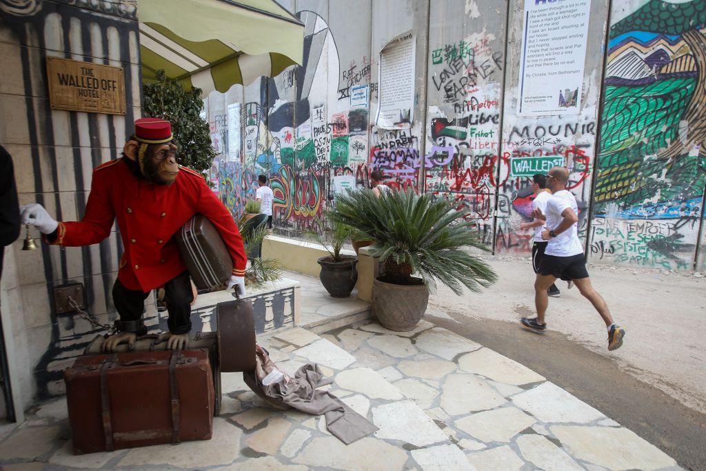 The exterior of The Banksy Off The Wall Hotel, situated next to the security barrier in Bethelehem (Wisam Hashlamoun/Flash 90)