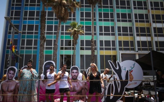 Israelis take part the annual Gay Pride Parade in Tel Aviv, on Friday, June 9, 2017 (Hadas Parush/Flash90)