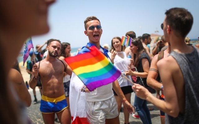 Israelis take part the annual Gay Pride Parade in Tel Aviv, on Friday, June 9, 2017 (Hadas Parush/Flash90)