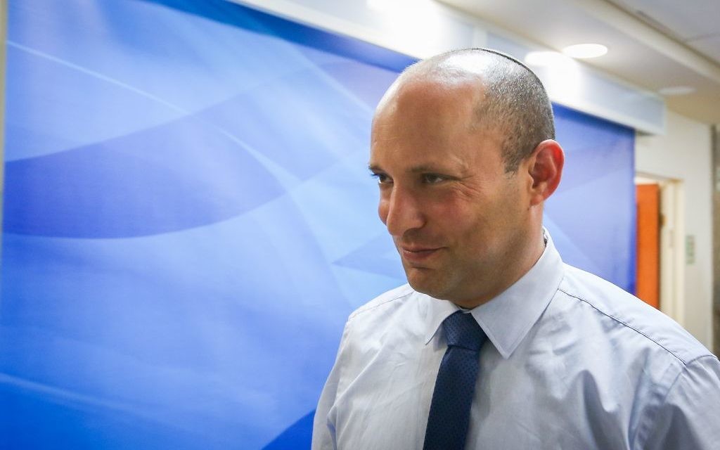 Education Minister Naftali Bennett arrives for the weekly cabinet meeting at the Prime Minister office in Jerusalem, June 11, 2017. (Marc Israel Sellem/POOL)