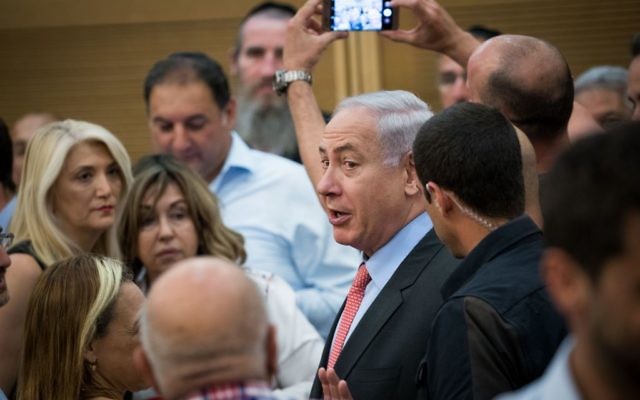 Prime Minister Benjamin Netanyahu arrives to a Likud party meeting at the Knesset on June 12, 2017. (Yonatan Sindel/Flash90) Prime Minister Benjamin Netanyahu arrives to a Likud party meeting at the Knesset on June 12, 2017. (Yonatan Sindel/Flash90)