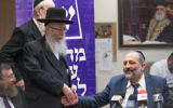 Shas party leader Interior Minister Aryeh Deri (R) United Torah Judaism party Mk Yaakov Litzman during a joint party meeting at the Knesset on June 19, 2017. (Yonatan Sindel/Flash90)