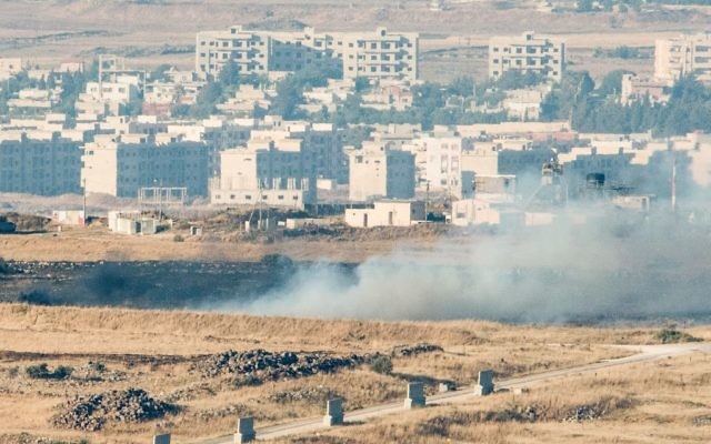 A picture taken from the Israeli side of the border shows smoke rising near the Israeli-Syrian border on June 24, 2017. (Basel Awidat/Flash90) A picture taken from the Israeli side of the border shows smoke rising near the Israeli-Syrian border on June 24, 2017. (Basel Awidat/Flash90)
