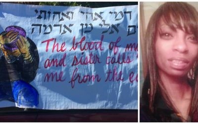 A banner made by one of the petitioners at the vigil for slain Seattle mother Charleena Lyles, right. (Rainer Waldman Adkins)