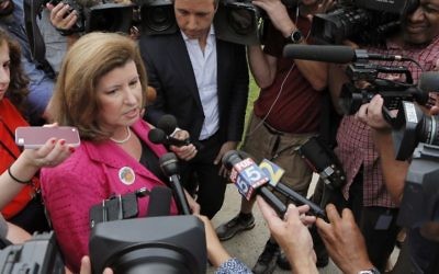 Karen Handel, Republican candidate for Congress, talks to the press Tuesday, June 20, 2017, after she voted in the 6th District Special Election at St Mary's Orthodox Church in Roswell, Ga. (Bob Andres/Atlanta Journal-Constitution via AP)