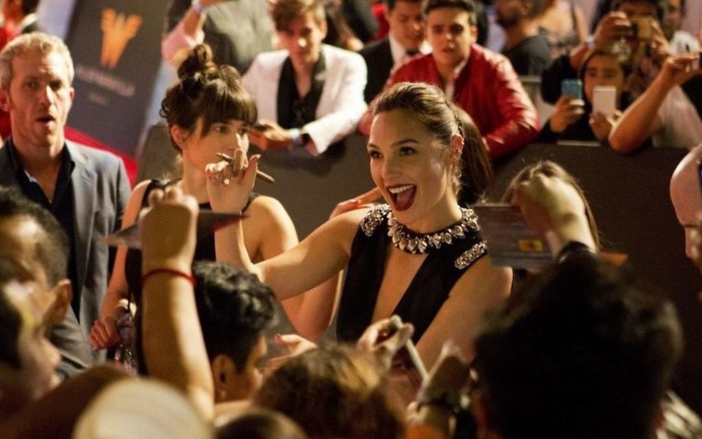 Israeli actress Gal Gadot signs autographs and greets fans during the Latin American premiere of the film 'Wonder Woman' in Mexico City, May 27, 2017. (AP Photo/Rebecca Blackwell, File) Israeli actress Gal Gadot signs autographs and greets fans during the Latin American premiere of the film 'Wonder Woman' in Mexico City, May 27, 2017. (AP Photo/Rebecca Blackwell, File)