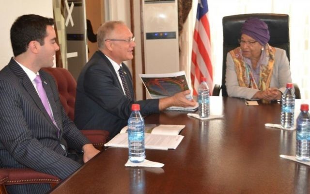 Israeli Ambassador to Ghana and Liberia Ami Mehl, left, Yossi Abramowitz, center, and Liberian President H.E. Ellen Johnson Sirleaf, discuss future solar fields and Liberia‘s energy sector on Sunday, June 4 2017. (courtesy Energiya Global) Israeli Ambassador to Ghana and Liberia Ami Mehl, left, Yossi Abramowitz, center, and Liberian President H.E. Ellen Johnson Sirleaf, discuss future solar fields and Liberia‘s energy sector on Sunday, June 4 2017. (courtesy Energiya Global)