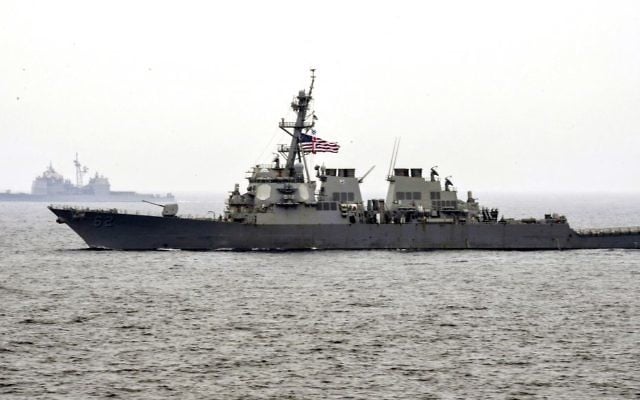 In this June 1, 2017 photo, the guided-missile destroyer USS Fitzgerald, foreground, (DDG 62) makes its way with the Carl Vinson Carrier Strike Group, through the Sea of Japan. (Mass Communication Specialist 3rd Class Kelsey L. Adams/US Navy via AP) In this June 1, 2017 photo, the guided-missile destroyer USS Fitzgerald, foreground, (DDG 62) makes its way with the Carl Vinson Carrier Strike Group, through the Sea of Japan. (Mass Communication Specialist 3rd Class Kelsey L. Adams/US Navy via AP)