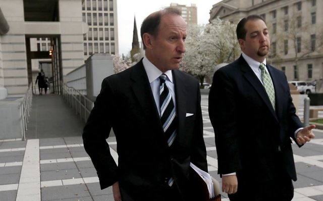 In this April 22, 2015, file photo, Abbe Lowell (L) walks out of Martin Luther King Jr. Federal Court following a pretrial hearing for his client Sen. Bob Menendez in Newark, New Jersey. (AP Photo/Julio Cortez, File) In this April 22, 2015, file photo, Abbe Lowell (L) walks out of Martin Luther King Jr. Federal Court following a pretrial hearing for his client Sen. Bob Menendez in Newark, New Jersey. (AP Photo/Julio Cortez, File)