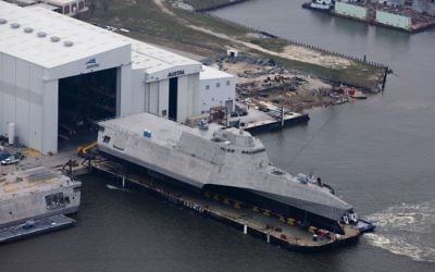 An aerial view of the US Navy littoral combat ship USS Gabrielle Giffords (LCS-10) during its launch sequence at the Austal USA shipyard, Mobile, Alabama, February 24, 2015.  (U.S. Navy photo, public domain)