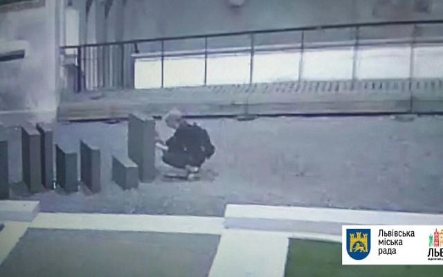Lviv City officials release still of vandals damaging city's Holocaust memorial with neo-Nazi graffiti on June 21, 2017. (Courtesy Lviv City Hall)