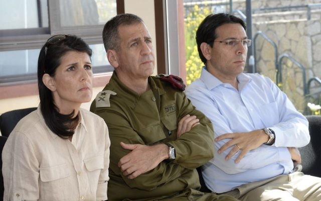 UN envoy Nikki Haley listens to a briefing from an IDF officer on the Lebanese border on June 8 2017 with Deputy IDF Chief Aviv Kochavi, center, and Israeli Ambassador to the UN Danny Danon (David Azagury/U.S. Embassy Tel Aviv) UN envoy Nikki Haley listens to a briefing from an IDF officer on the Lebanese border on June 8 2017 with Deputy IDF Chief Aviv Kochavi, center, and Israeli Ambassador to the UN Danny Danon (David Azagury/U.S. Embassy Tel Aviv)