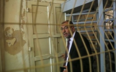 In this Monday, June 5, 2017 photo, the Mayor of Hebron Tayseer Abu Sneineh goes through an Israeli checkpoint to visit an Israeli controlled part of the West Bank city of Hebron. (AP/Nasser Shiyoukhi)