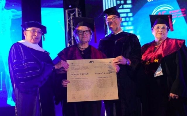 Prof. Deborah Lipstadt receives honorary doctor of philosophy degree from University of Haifa, June 6, 2017. Left to right: Prof. Ron Robin, President of the University of Haifa; Prof. Deborah E. Lipstadt; Prof. Gustavo Mesch, Rector of the University of Haifa; Ilana Livnat. (University of Haifa) Prof. Deborah Lipstadt receives honorary doctor of philosophy degree from University of Haifa, June 6, 2017. Left to right: Prof. Ron Robin, President of the University of Haifa; Prof. Deborah E. Lipstadt; Prof. Gustavo Mesch, Rector of the University of Haifa; Ilana Livnat. (University of Haifa)